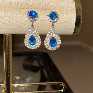 Azure Blue Rhinestone and Gold dangling pierced earrings.